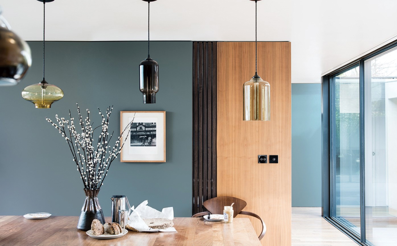 Blue dining room painted in De Nimes with wood panelling